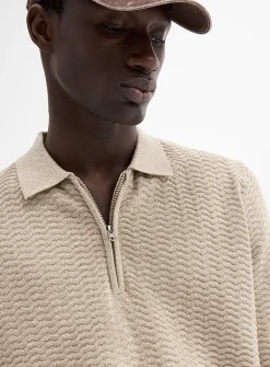 Embossed herringbone knit polo