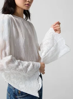 Embroidered bell-sleeve blouse