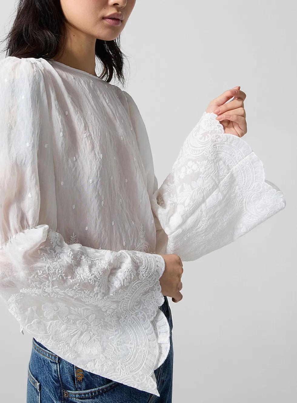 Embroidered bell-sleeve blouse