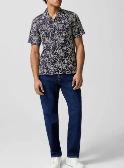 Embroidered pocket stretch tapered jean