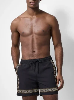 Embroidered-trim swim trunk