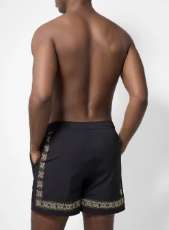 Embroidered-trim swim trunk