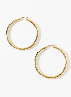 Extra-large golden tubular hoops