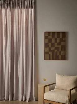 Extra-long neutral-coloured sheer curtain