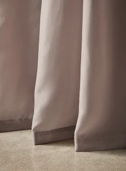 Extra-long neutral-coloured sheer curtain