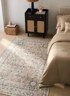 Faded floral fresco rug