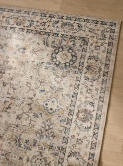 Faded floral fresco rug