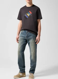 Faded sand tone tapered jean