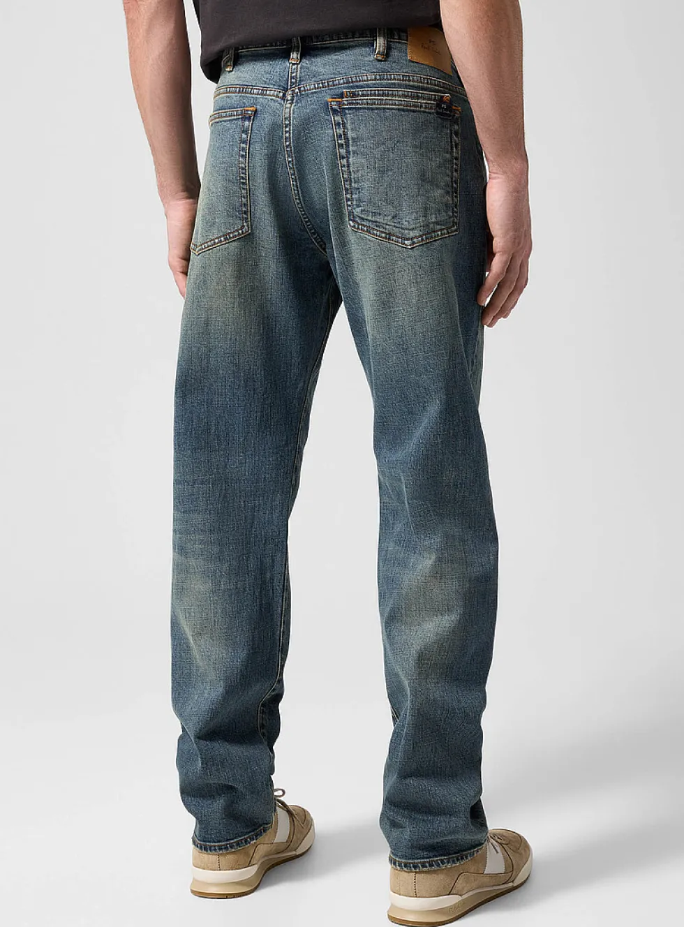 Faded sand tone tapered jean