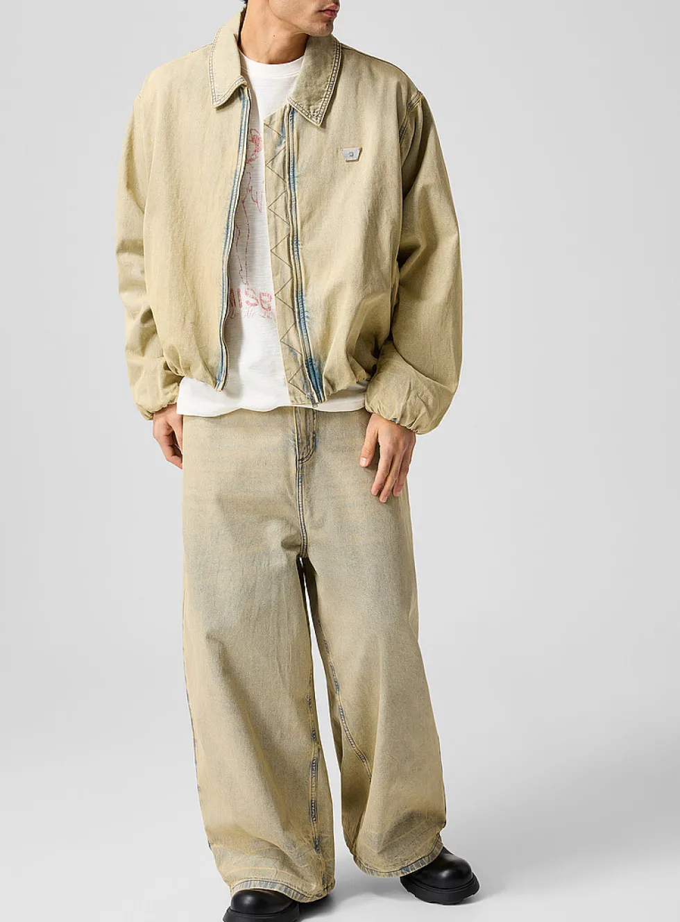Faded sandy tone barrel-leg jean