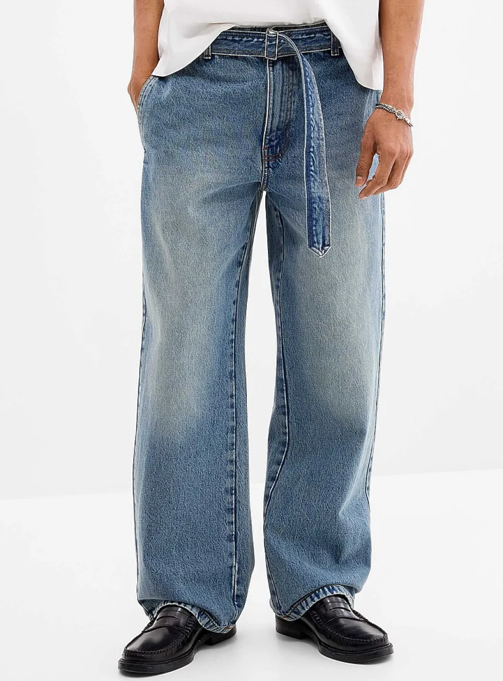 Faded-blue belted jean