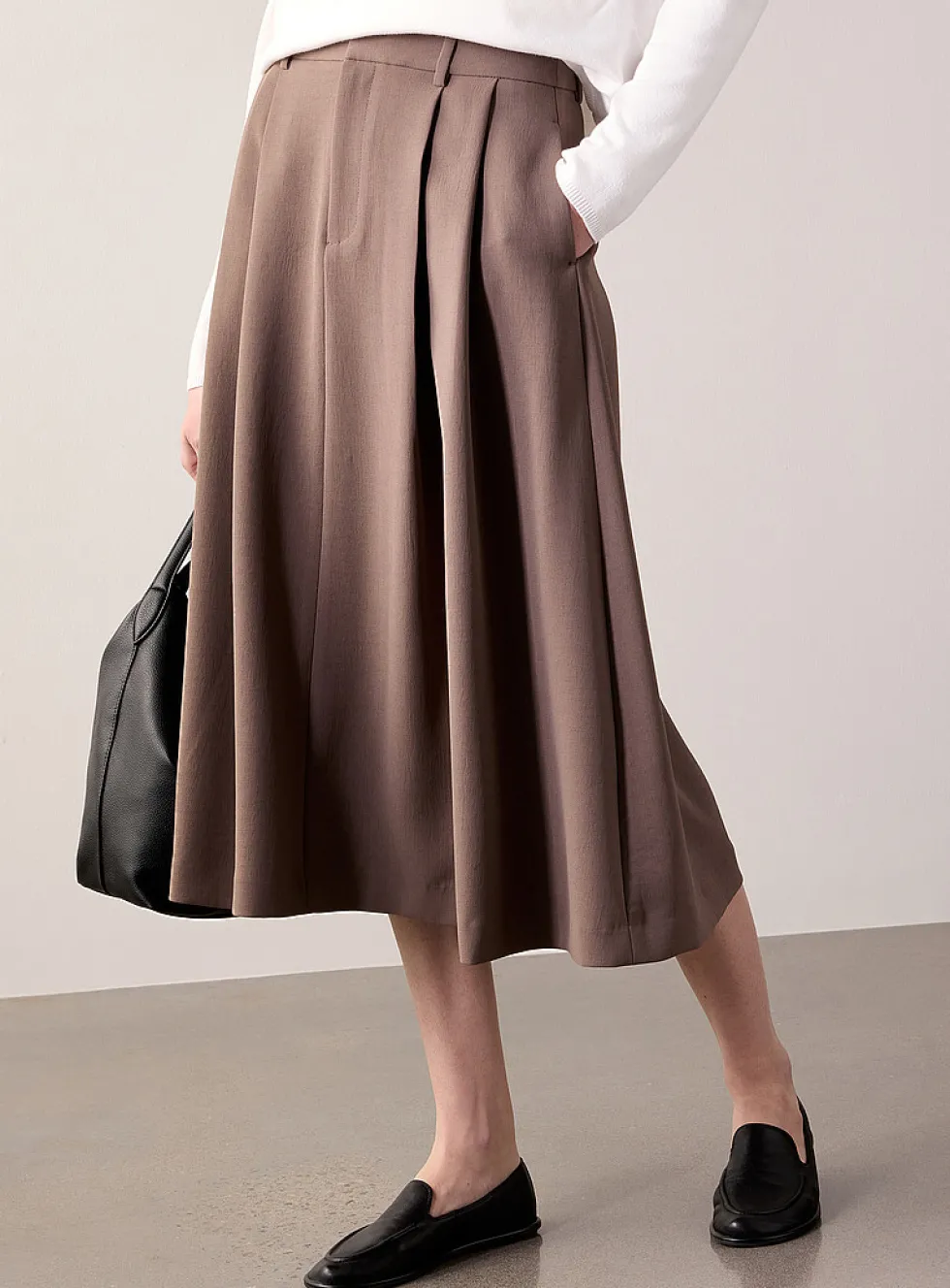 Flared textured crepe pleated skirt