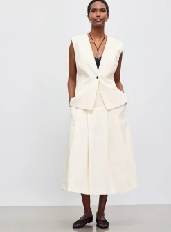 Flat-pleat vanilla midi skirt