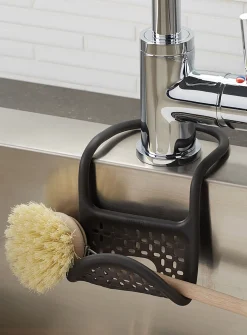 Flexible kitchen sink sponge holder