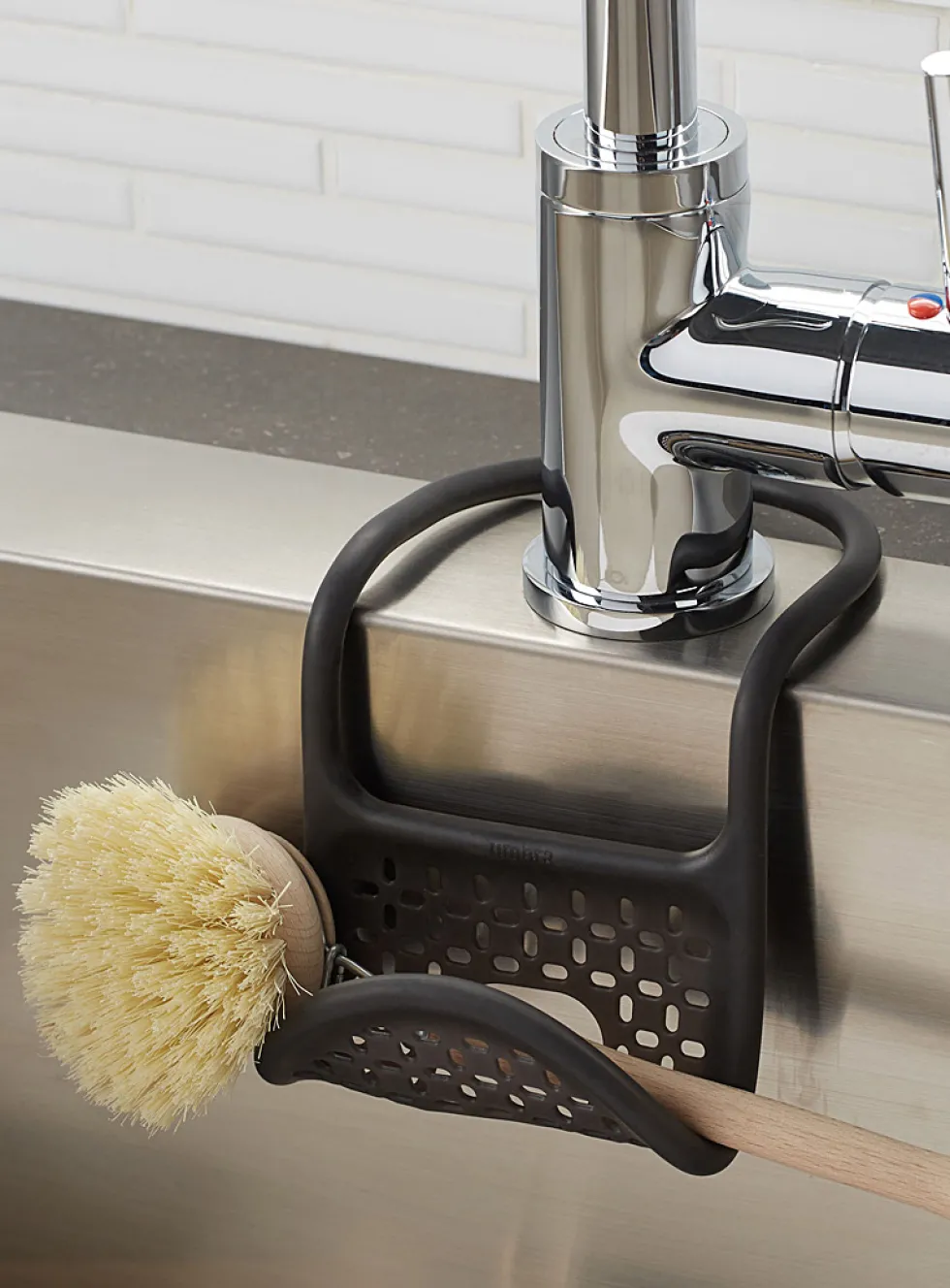 Flexible kitchen sink sponge holder