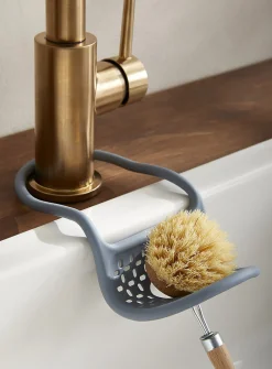 Flexible kitchen sink sponge holder