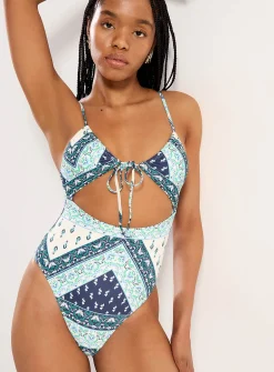 Floral tapestry cutout one-piece