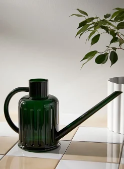 Fluted transparent watering can