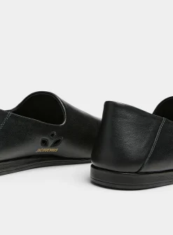 Foldable black leather flats