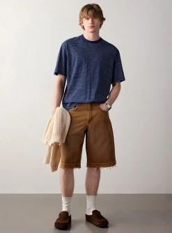 Frayed faded-brown jort