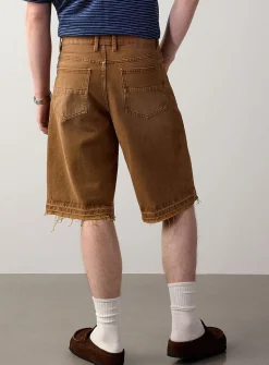 Frayed faded-brown jort