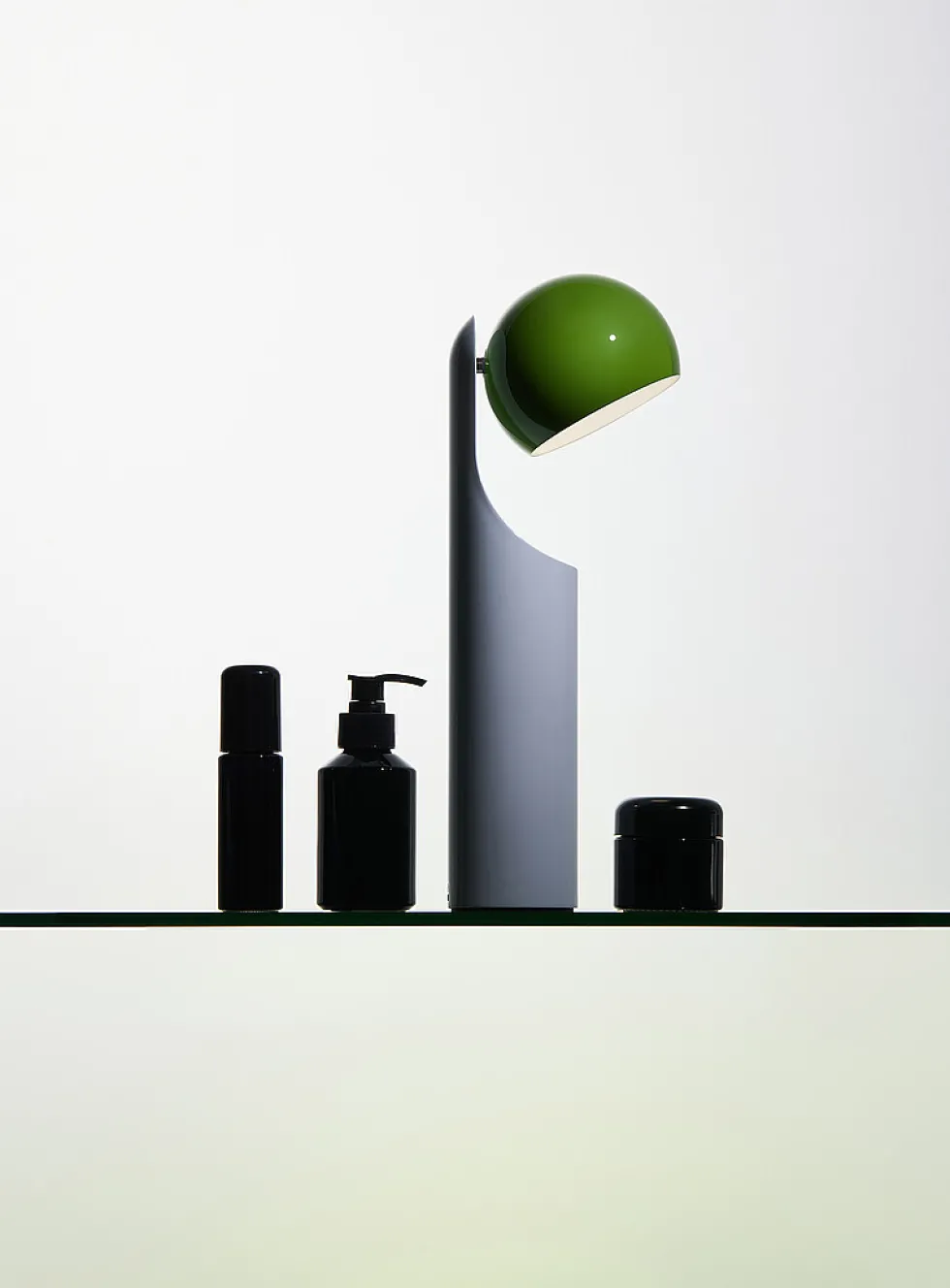 Geometric articulated portable lamp