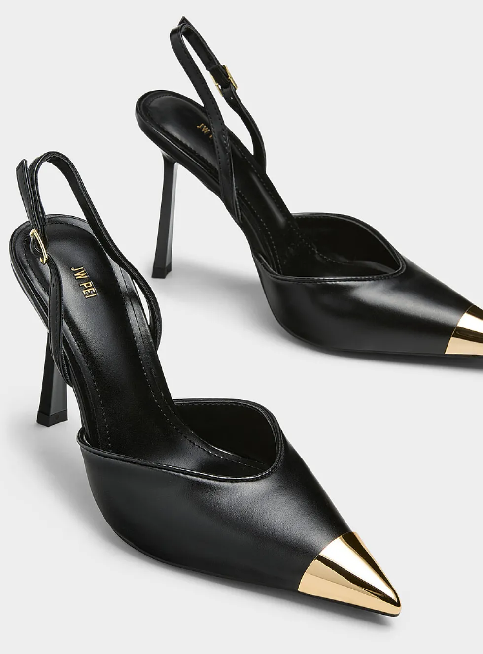 Gold pointed-toe slingback pumps