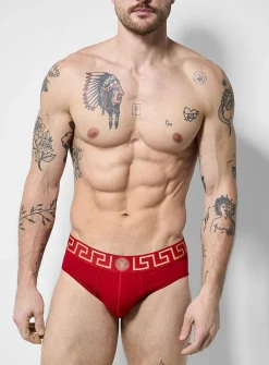 Gold signature logo red brief