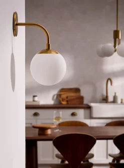 Golden opal celestial body sconce