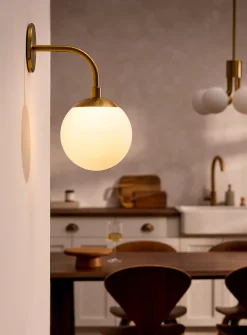 Golden opal celestial body sconce