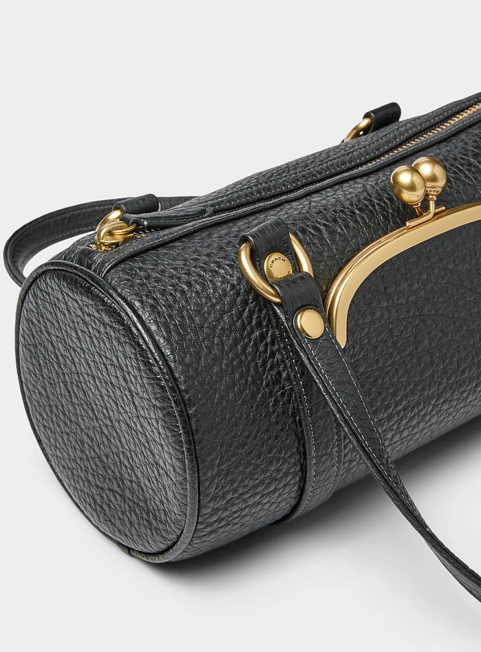 Grained leather cylindrical shoulder bag