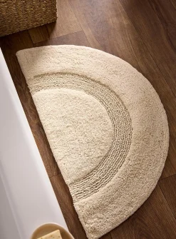 Half-moon bath mat