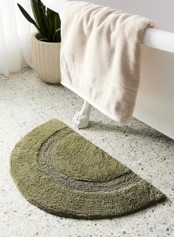 Half-moon bath mat