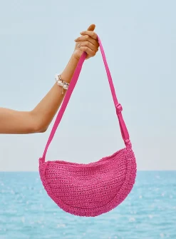 Half-moon braided straw crossbody bag