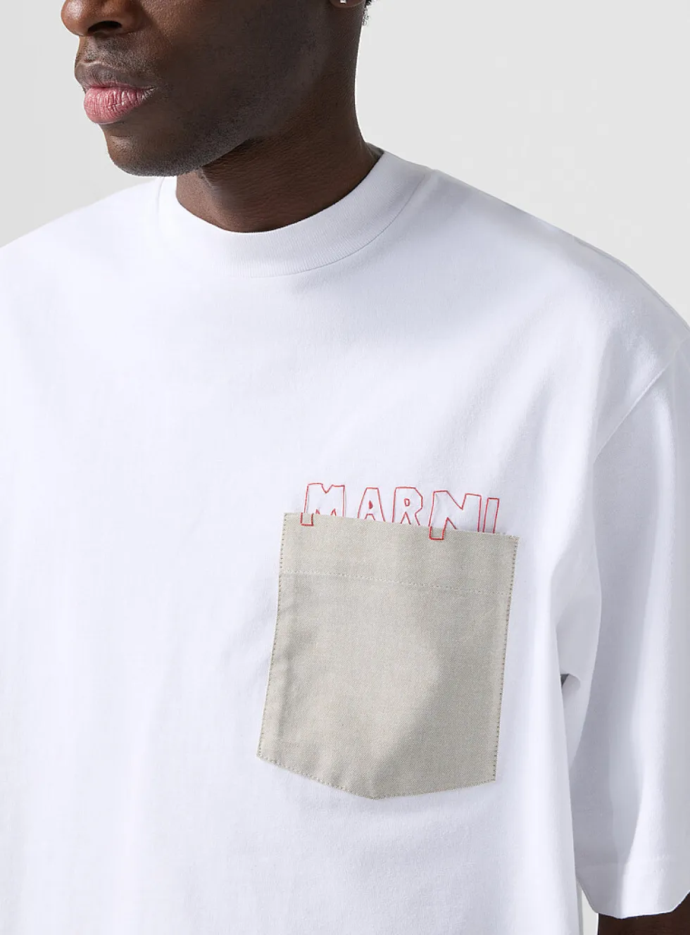 Hidden logo contrast-pocket T-shirt