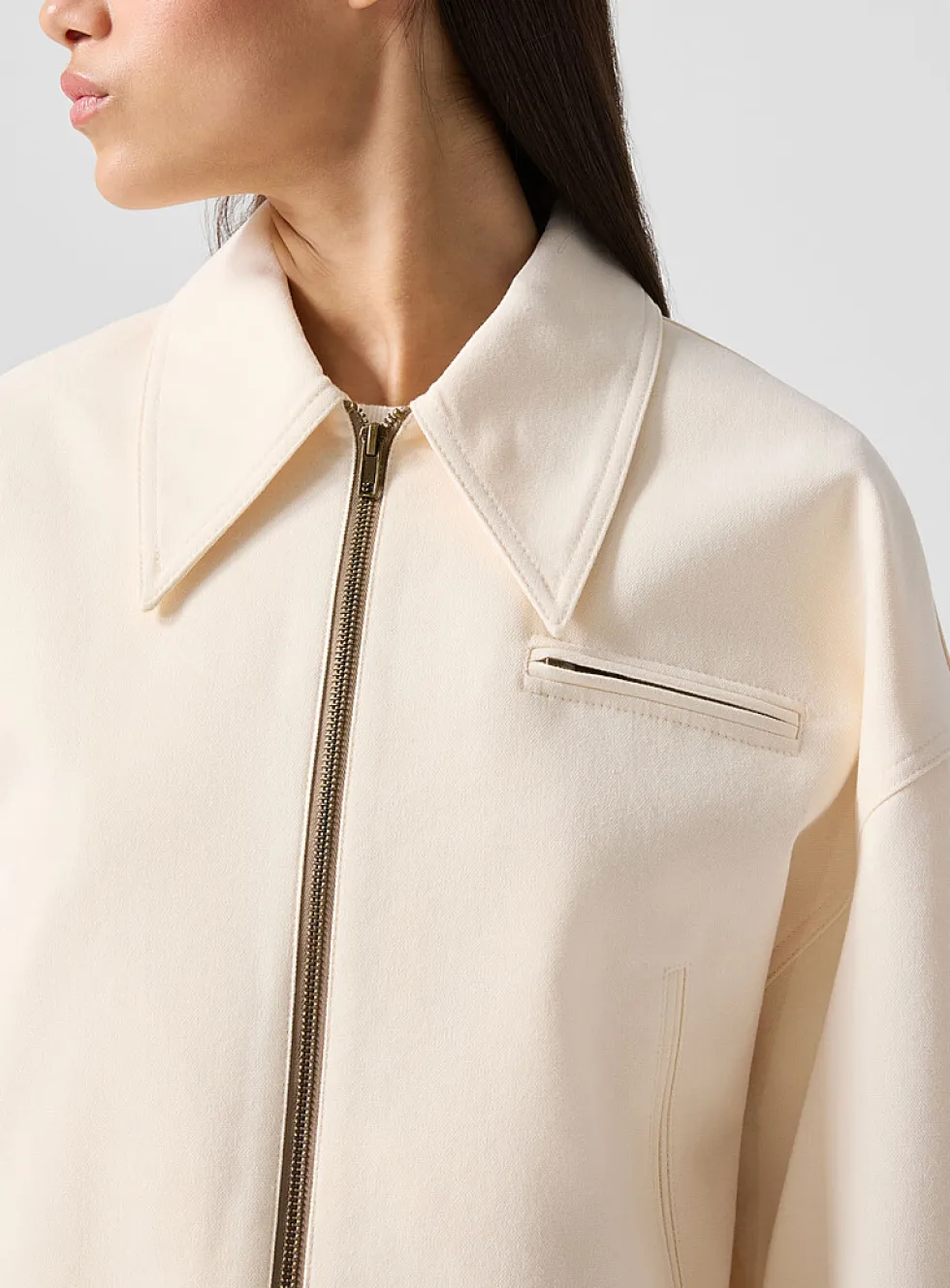 Ivory zippered cropped jacket