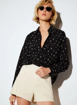 Jewel-button printed fluid blouse