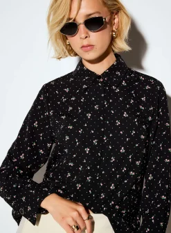 Jewel-button printed fluid blouse