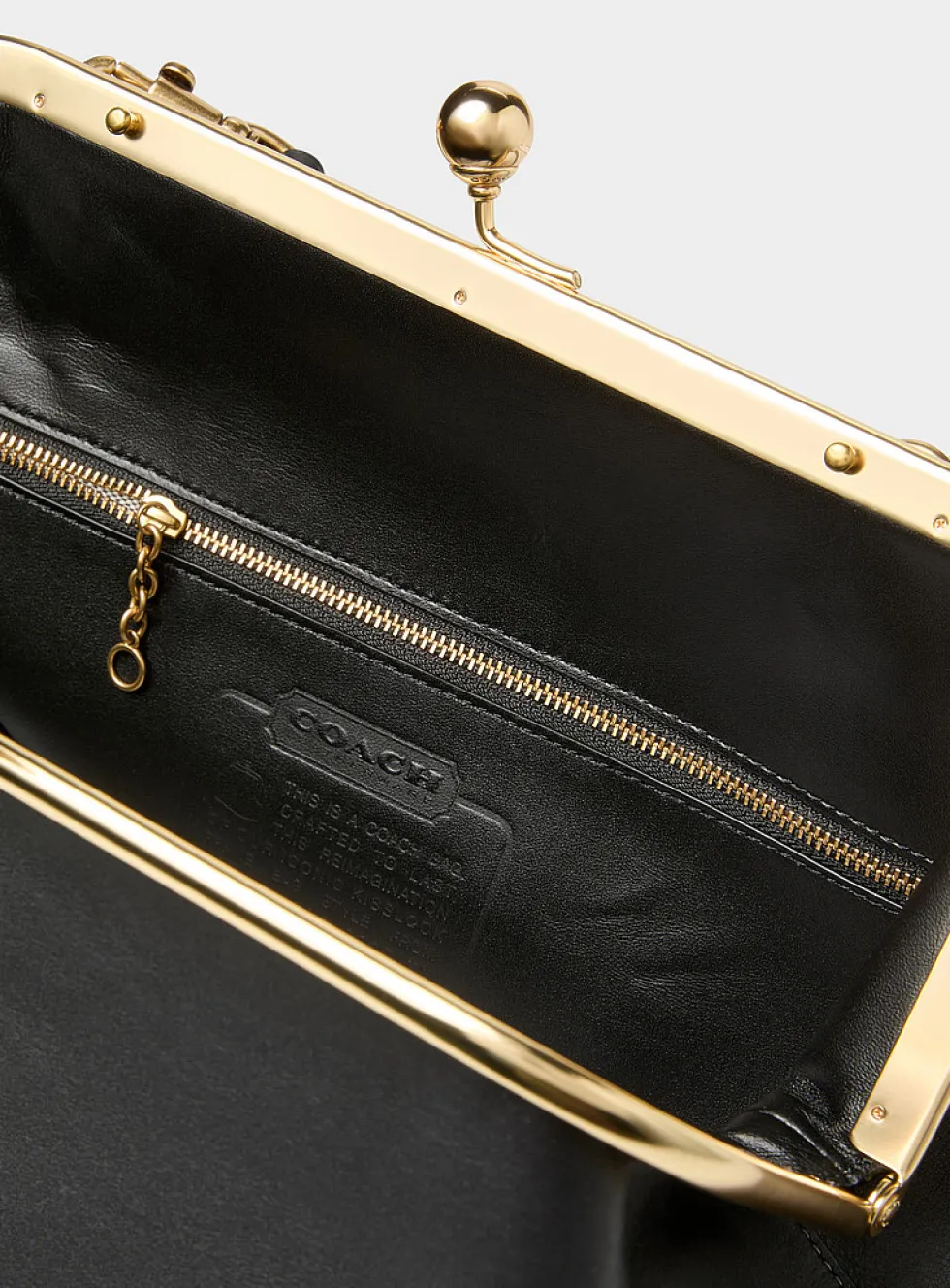 Kisslock ebony leather minaudière