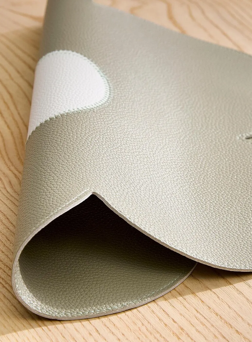 Large flower faux-leather placemat