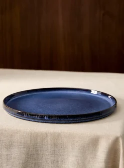 Large grooved blue plate