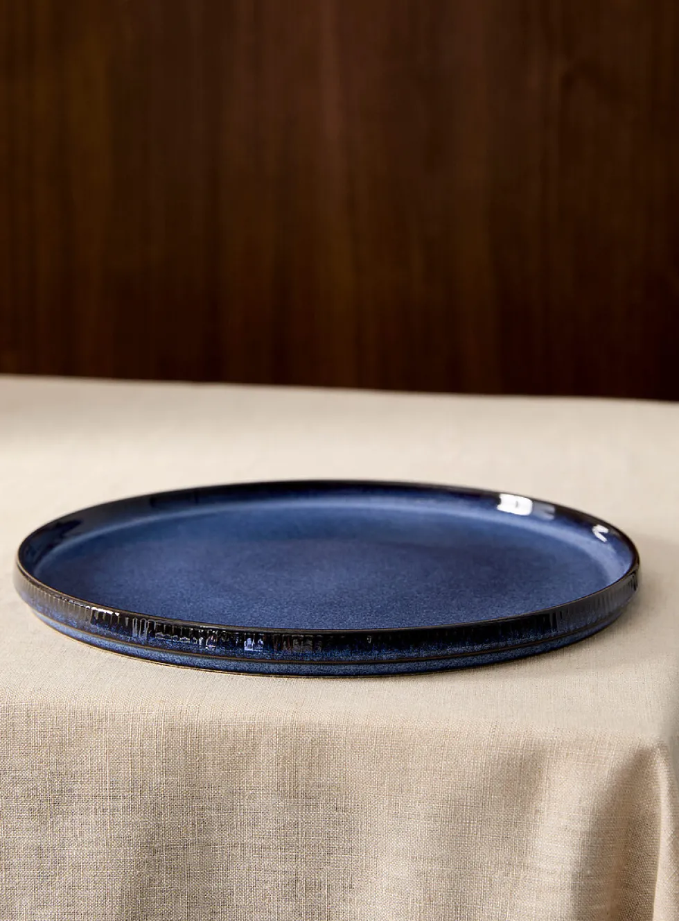 Large grooved blue plate