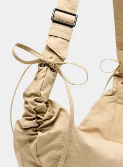 Large half-moon crisp fabric shoulder bag