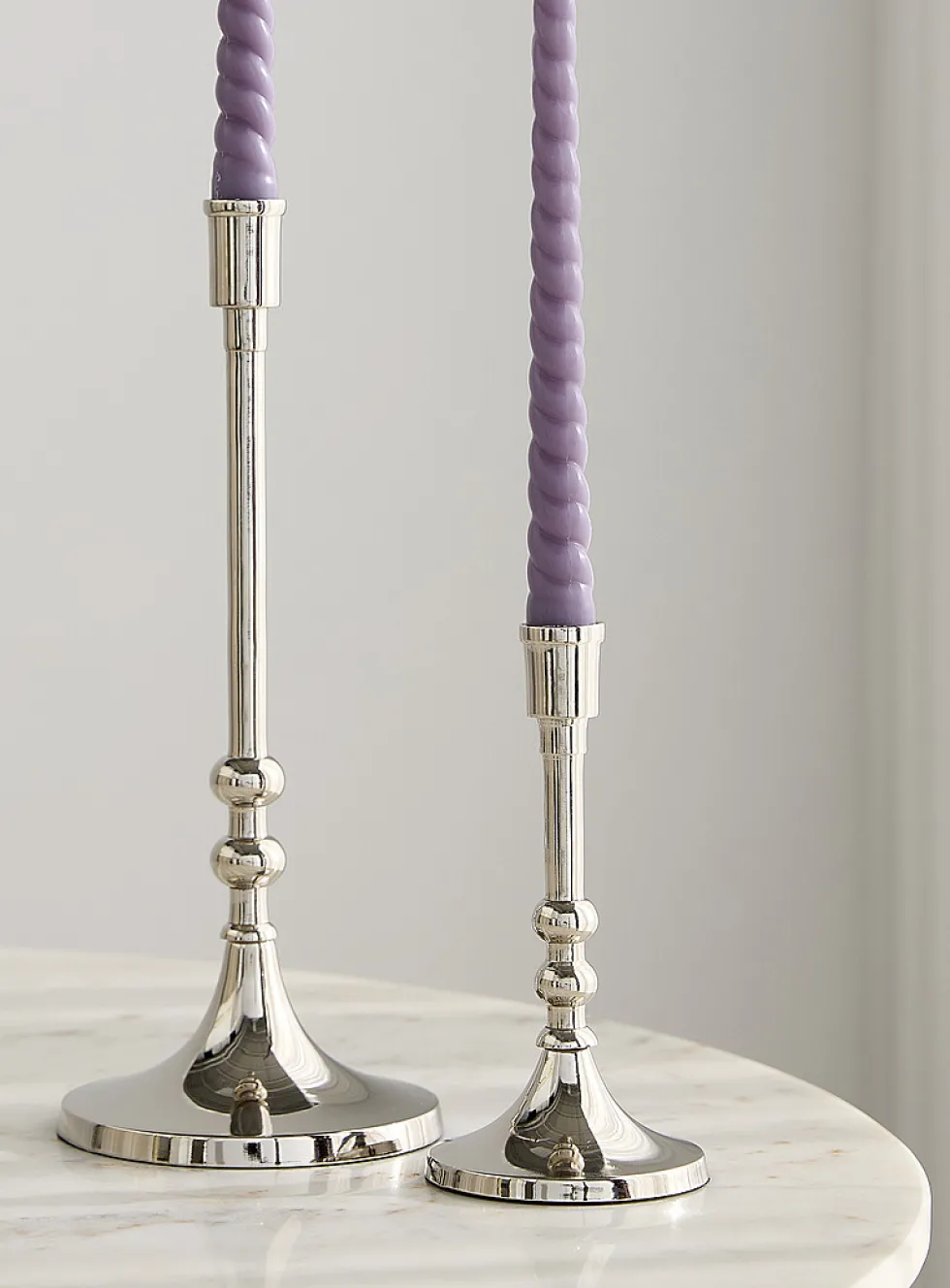 Large metallic candle holder