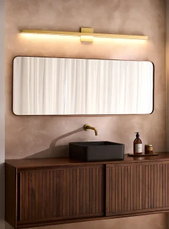 Large slender golden sconce