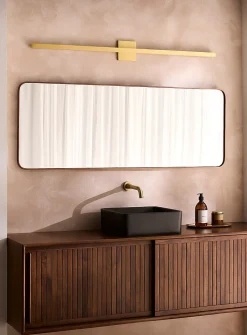 Large slender golden sconce
