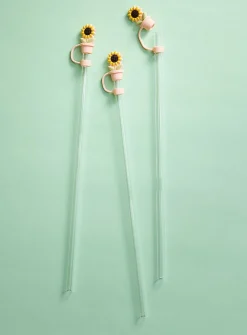Large transparent straws with playful stoppers