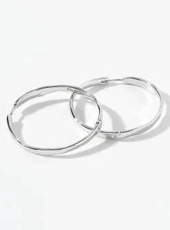 Large wavy hoops