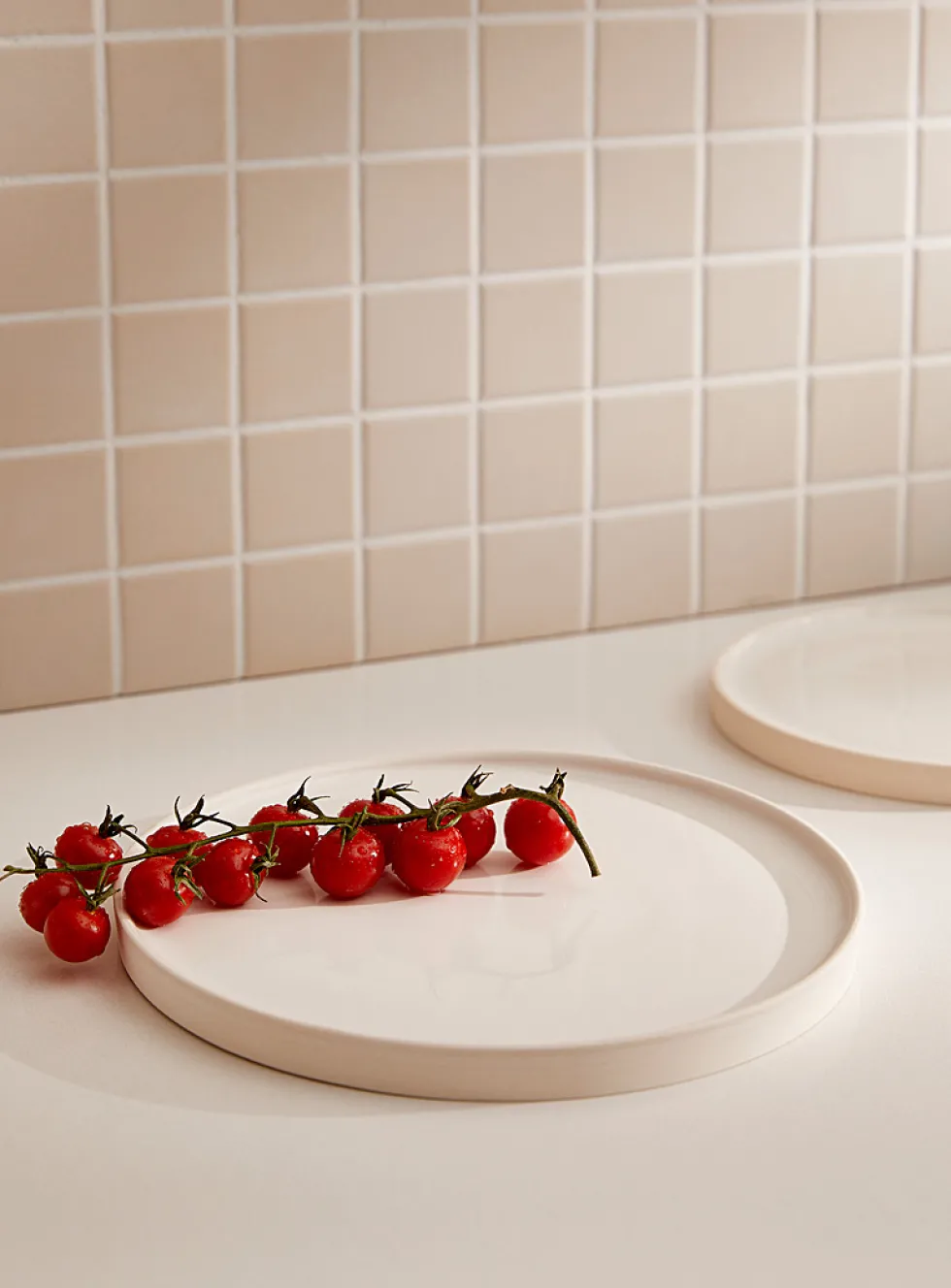 Large white glazed ceramic plate