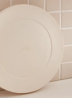 Large white glazed ceramic plate